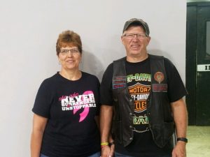 Wayne Edingfield standing with his wife